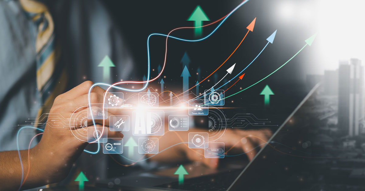Hands typing on a laptop with floating digital icons and upward arrows, symbolizing growth and technology against a blurred cityscape background.