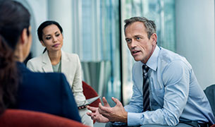 Image Agency sales team collaborating with agents on underwriting.
