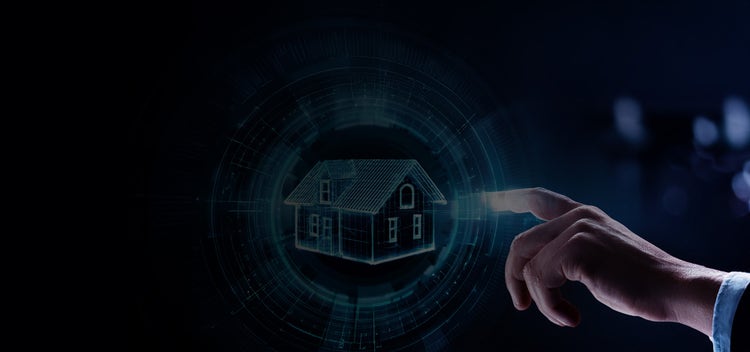 finger points towards a digital rendering of a house