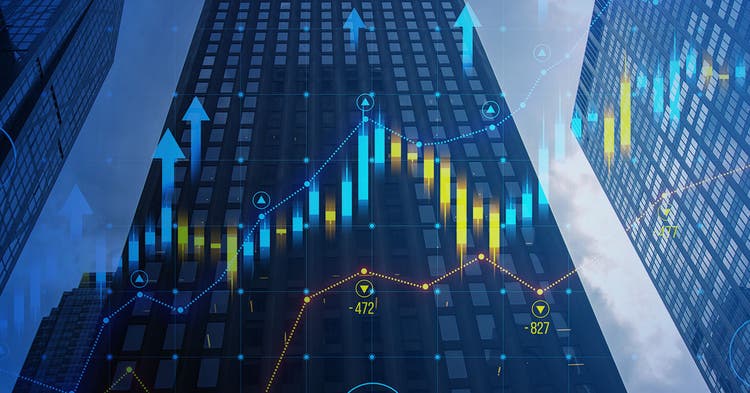 Skyscrapers with superimposed financial charts
