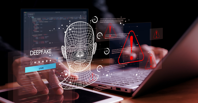 Hands on a laptop and tablet with connotation of fraudelent activity