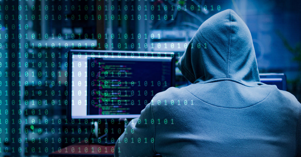 Un hacker informático en un sistema de seguridad para robar información crítica.